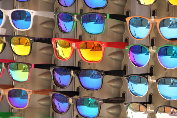 many colorful sunglasses for sale stock photo