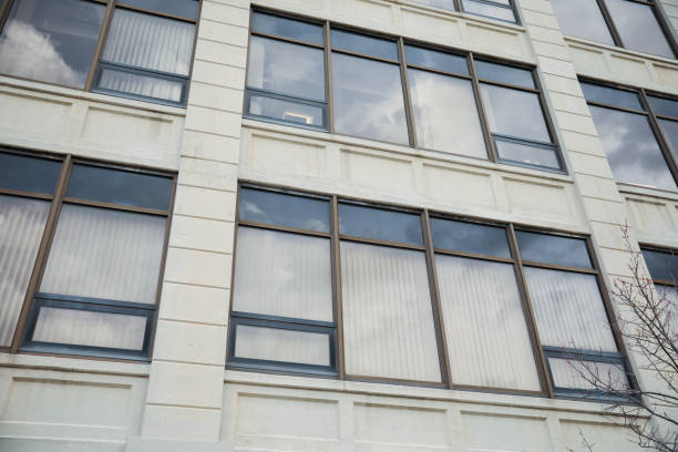 istock stone buildings with large windows symbolizes stability and strength with a connection to nature. Stone represents durability, while large windows convey openness and a desire for natural light 1478788280