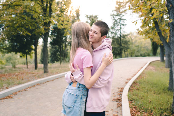 istock Teen couple holding each other having fun 1478790976