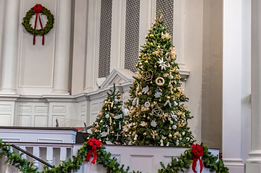 The decorated Christmas trees in the historic southern Baptist church