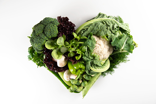 Heart shaped, green healthy foods.