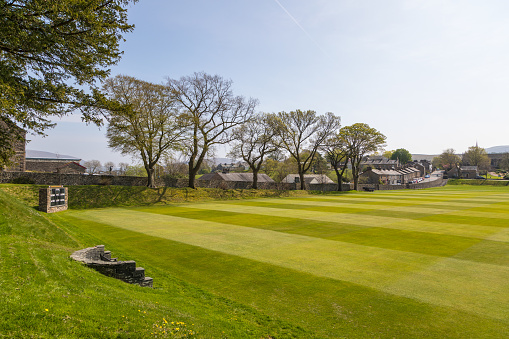 Sedbergh, Yorkshire, UK - 20 April 2019: View if the buildings of the Sedbergh village. School playground. Sunny spring day. Yorkshire Dales, UK