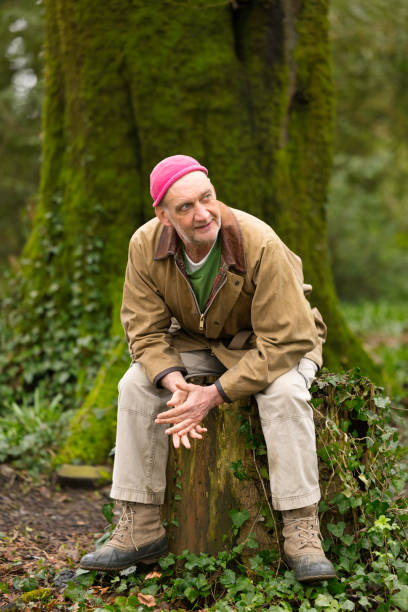 istock Cheerful old man out in the woods 1478810095