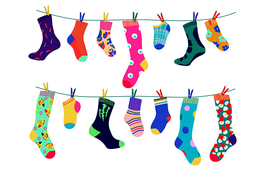 Socks on a rope with colored clothespins. Dry the sock and hang it on a clothesline with clothespins. Children's socks, for men and women. Flat design style. Vector illustration