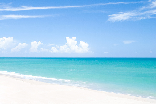 A perfect empty white sand beach on the gulf coast of Destin, Florida.