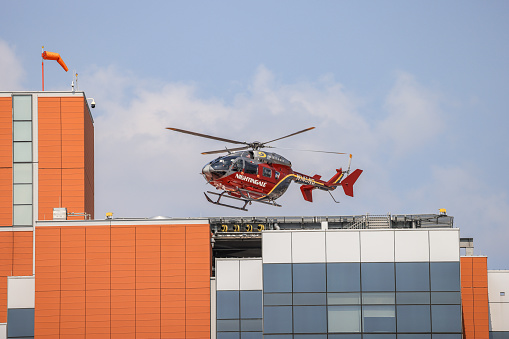 Norfolk, Virginia, USA - September 13, 2021: The Nightingale helicopter from Sentara Norfolk General Hospital heading out to an emergency. My all-time favorite job would be to pilot one of these machines.