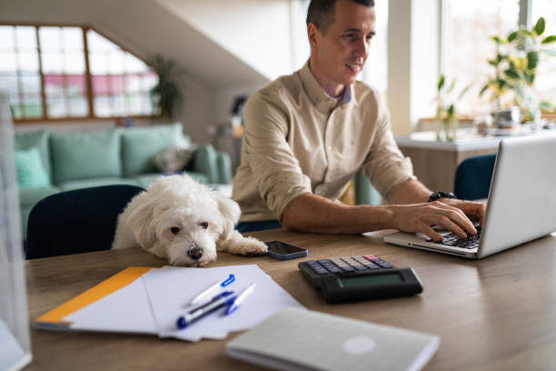 Man working on laptop at home