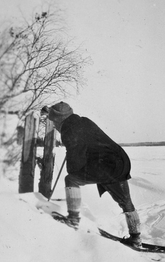 Cold Lake, Manitoba, Canada - March 1928. A man measuring the amount of recent snow fall at Cold Lake in Manitoba, Canada. Vintage photograph ca. 1928.