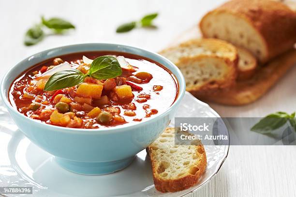 Bowl Of Minestrone Soup With A Slice Of Bread On The Side Stock Photo - Download Image Now