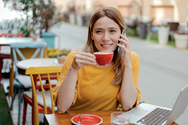 istock Coffee Shop Portrait with Phone Call 1478855779