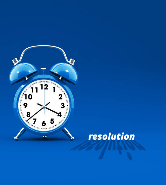 istock Blue color alarm clock and resolution text on blue color background 1478874265