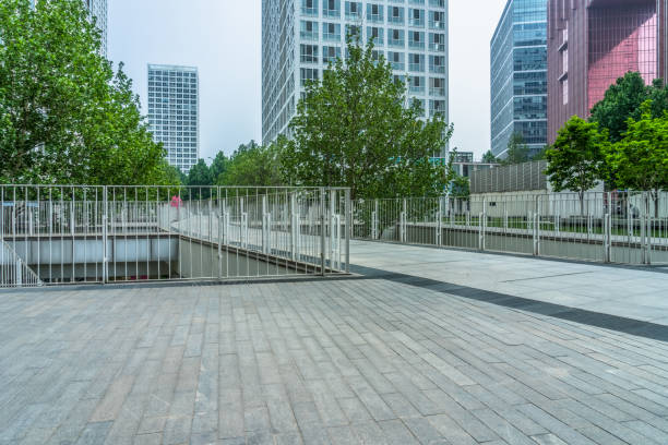 istock modern buildings and empty pavement in china 1478883489