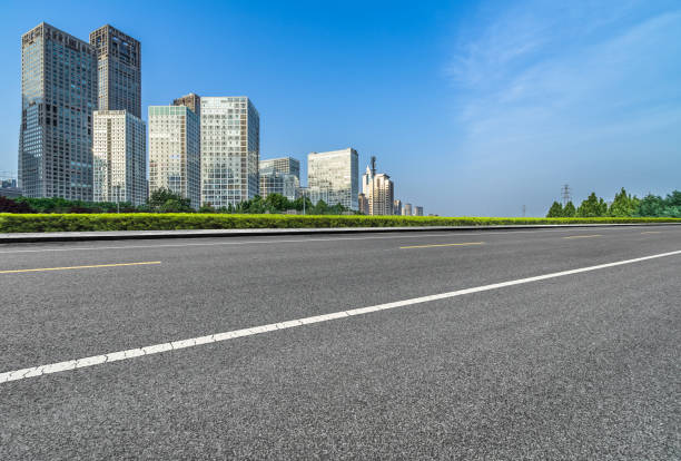 istock city empty traffic road with cityscape in background 1478887381