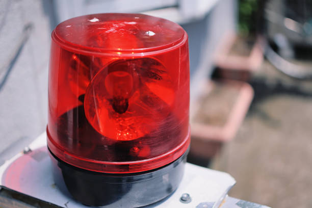 istock Red revolving light and blurred scenery 1478887537