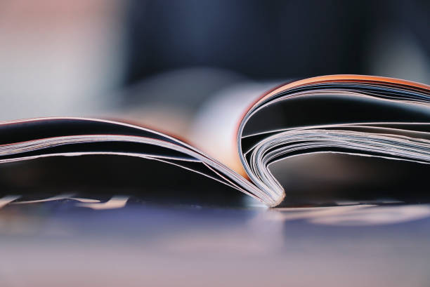 istock Magazine page open and background material 1478889381