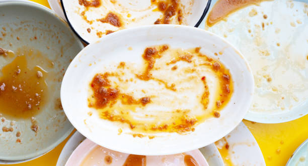 istock Dirty dishes on yellow background. Top view 1478891938