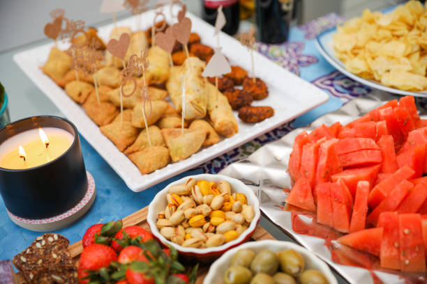 Cheese appetizer with hebs and dried vegetables on top