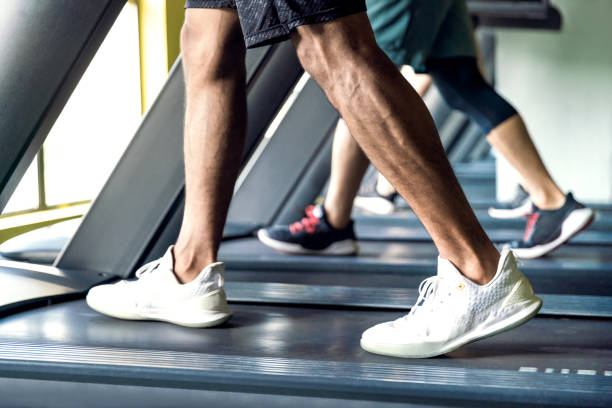 istock Men exercise on the treadmill in the gym. 1478905995