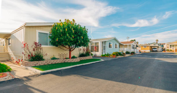 Mobile home park, age-restricted (55+) community in small beach town in California. Mobile home park, age-restricted (55+) community in small beach town in California. Architecture, street view manufactured housing stock pictures, royalty-free photos & images