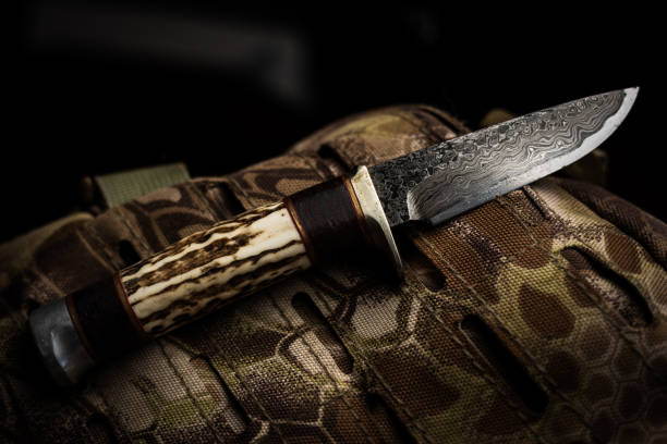 A custom Damascus and deer antler hand made knife stock photo