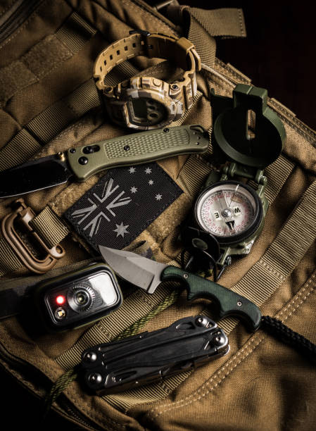 istock Flat lay tactical EDC and hiking gear on backpack 1478911083