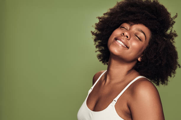 istock Content young African American female model smiling with closed eyes 1478914031