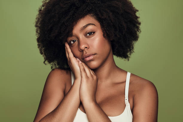 istock Charming black woman in underwear looking at camera and looking at camera 1478914037
