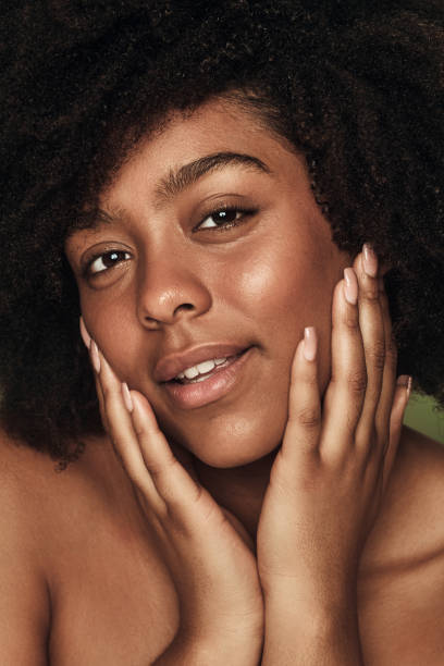 istock Charming black woman touching cheeks 1478914061