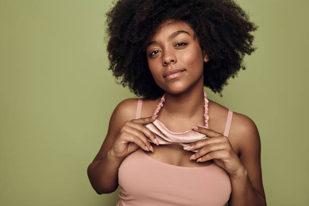 istock Black woman with sleeping mask in nightwear 1478914202