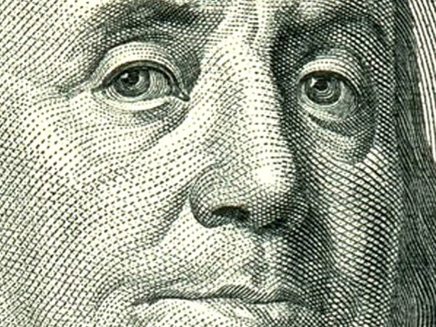 istock Macro close up of Ben Franklin's face on the US $100 dollar bill. 1478919367
