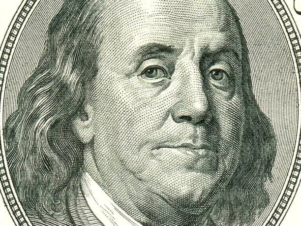 istock Macro close up of Ben Franklin's face on the US $100 dollar bill. 1478919384