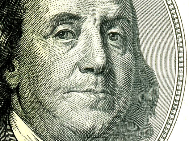 istock Macro close up of Ben Franklin's face on the US $100 dollar bill. 1478920952