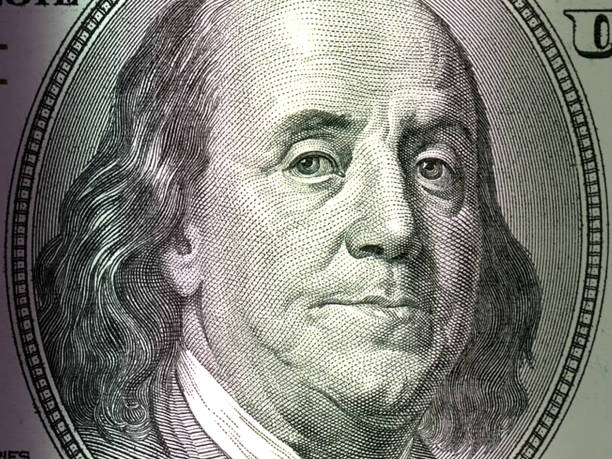 istock Macro close up of Ben Franklin's face on the US $100 dollar bill. 1478920955