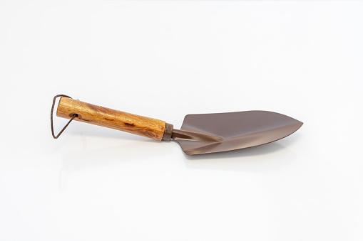 Scoop or shovel for gardening on isolated white background. selective focus