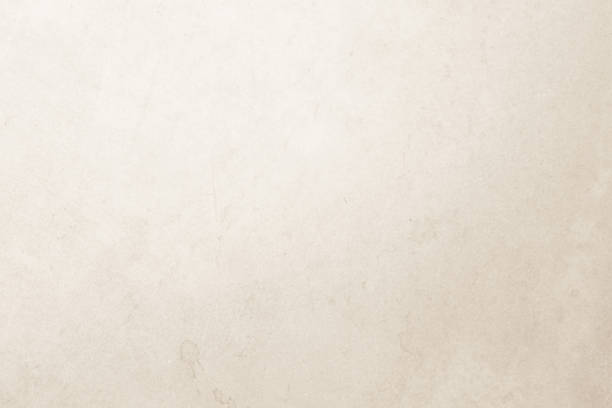 istock Colour old concrete wall texture background. Close Up retro plain cream color cement wall background texture. Design paper vintage parchment element show or advertise or promote product on display. 1478945733