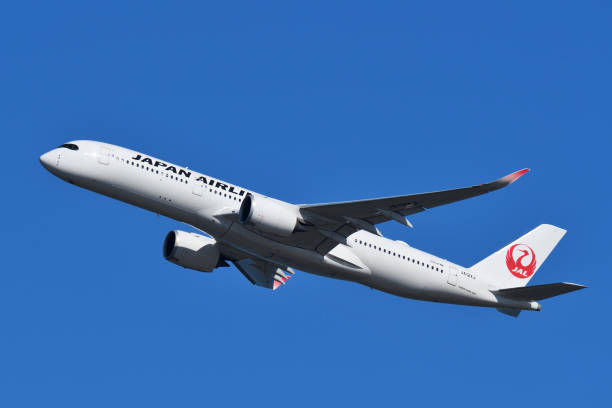 Japan Airlines (JAL) Airbus A350-900 (JA12XJ) passenger plane. Tokyo, Japan - March 19, 2023: Japan Airlines (JAL) Airbus A350-900 (JA12XJ) passenger plane. hit the road stock pictures, royalty-free photos & images
