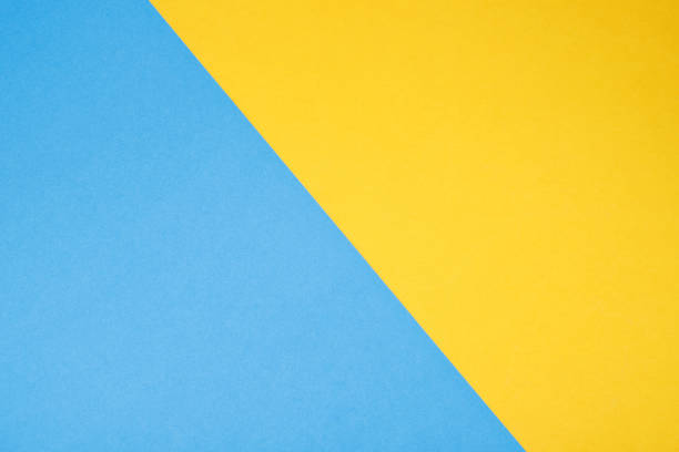 istock beautiful yellow blue paper background 1478948740