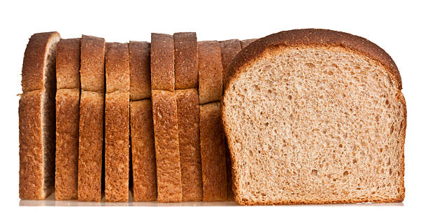 Whole wheat bread Whole wheat bread isolated slice of bread stock pictures, royalty-free photos & images
