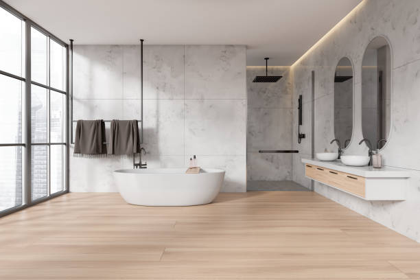 istock Stylish bathroom interior with bathtub, double sink and douche, panoramic window 1478958117