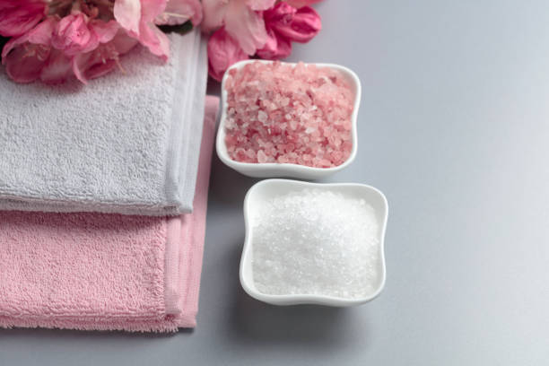 istock Spa composition with pink and white sea salt. 1478958532