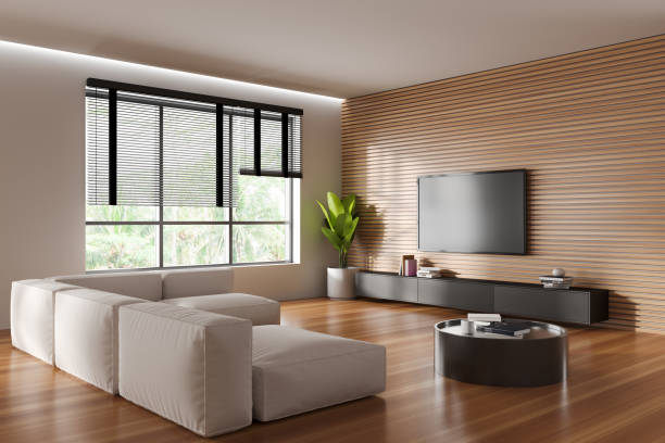 istock Modern chill interior with couch and tv screen, drawer and panoramic window 1478958575