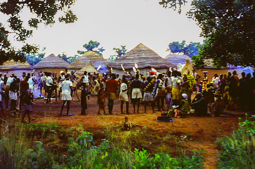 Rural Ghana - 1959: Villagers gather for some sort of celebration in a rural area of Ghana c.1959