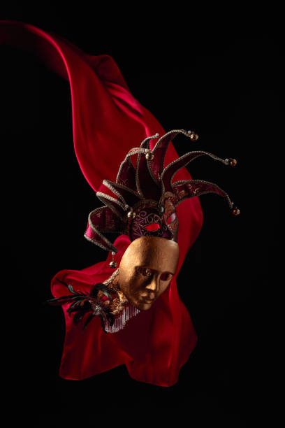 istock Old carnival masks with flutters red cloth. 1478959891