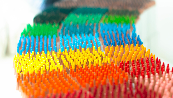 Colorful wooden pencils and on relaxed pastime