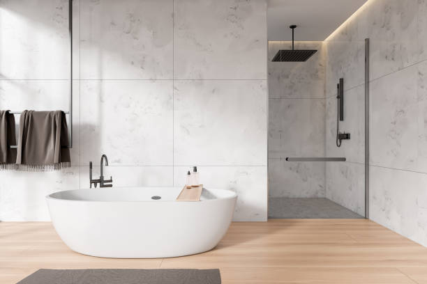 istock White marble bathroom with tub and shower 1478962823