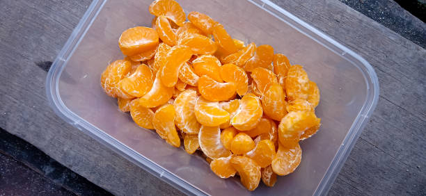 istock sweet orange pieces in the lunch box 1478971910