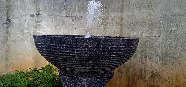 stone fountain decoration in the garden