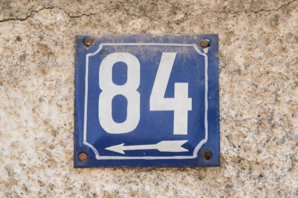 istock Weathered enameled plate number 84 1478995052