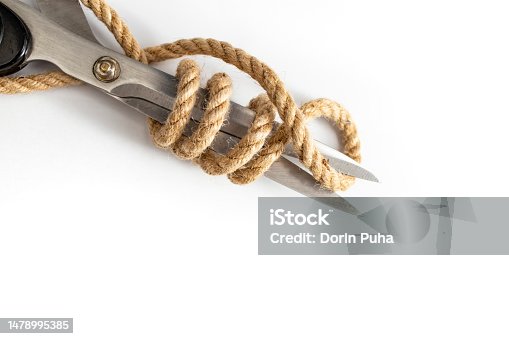 istock Jute rope wrapped around scissors blades, isolated on white 1478995385