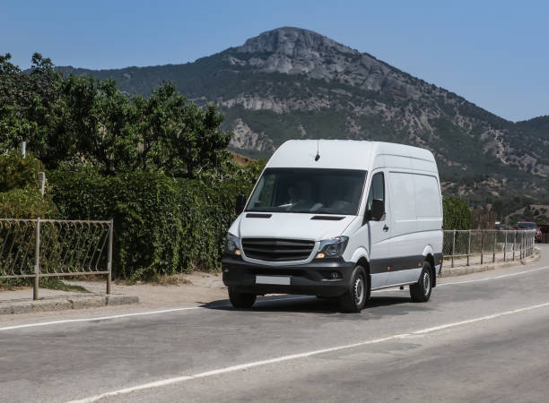 istock Minibus Rides on the  mountain highway 1479007590